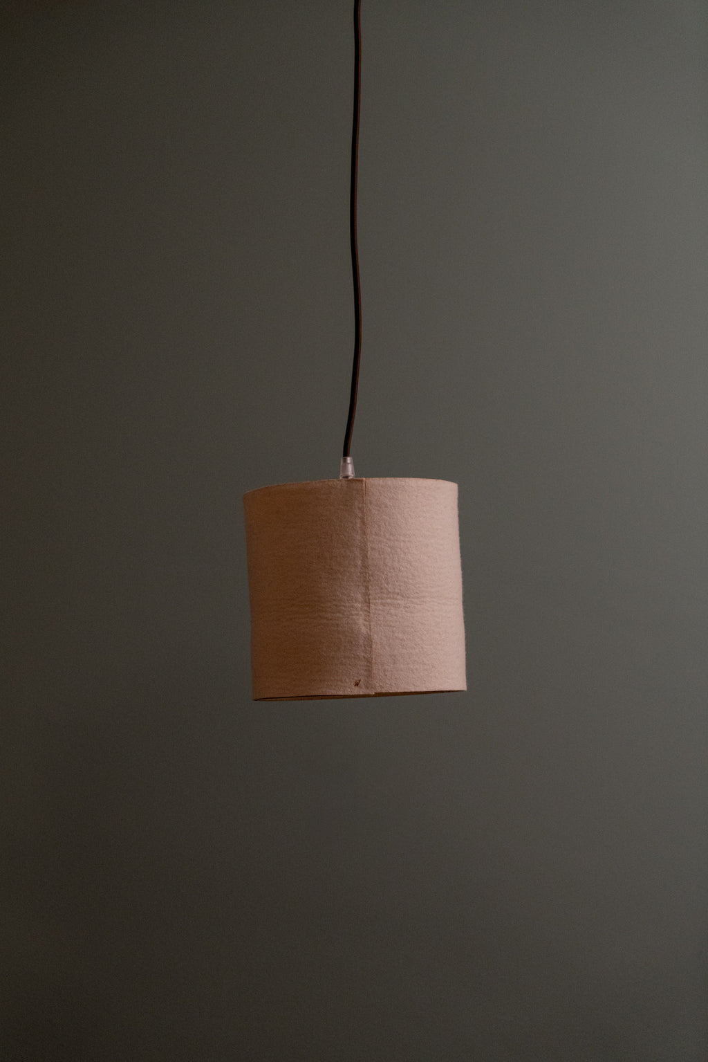 Natural wool ceiling lampshade in minimalist interior, sustainable lighting for boutique hotels and natural homes