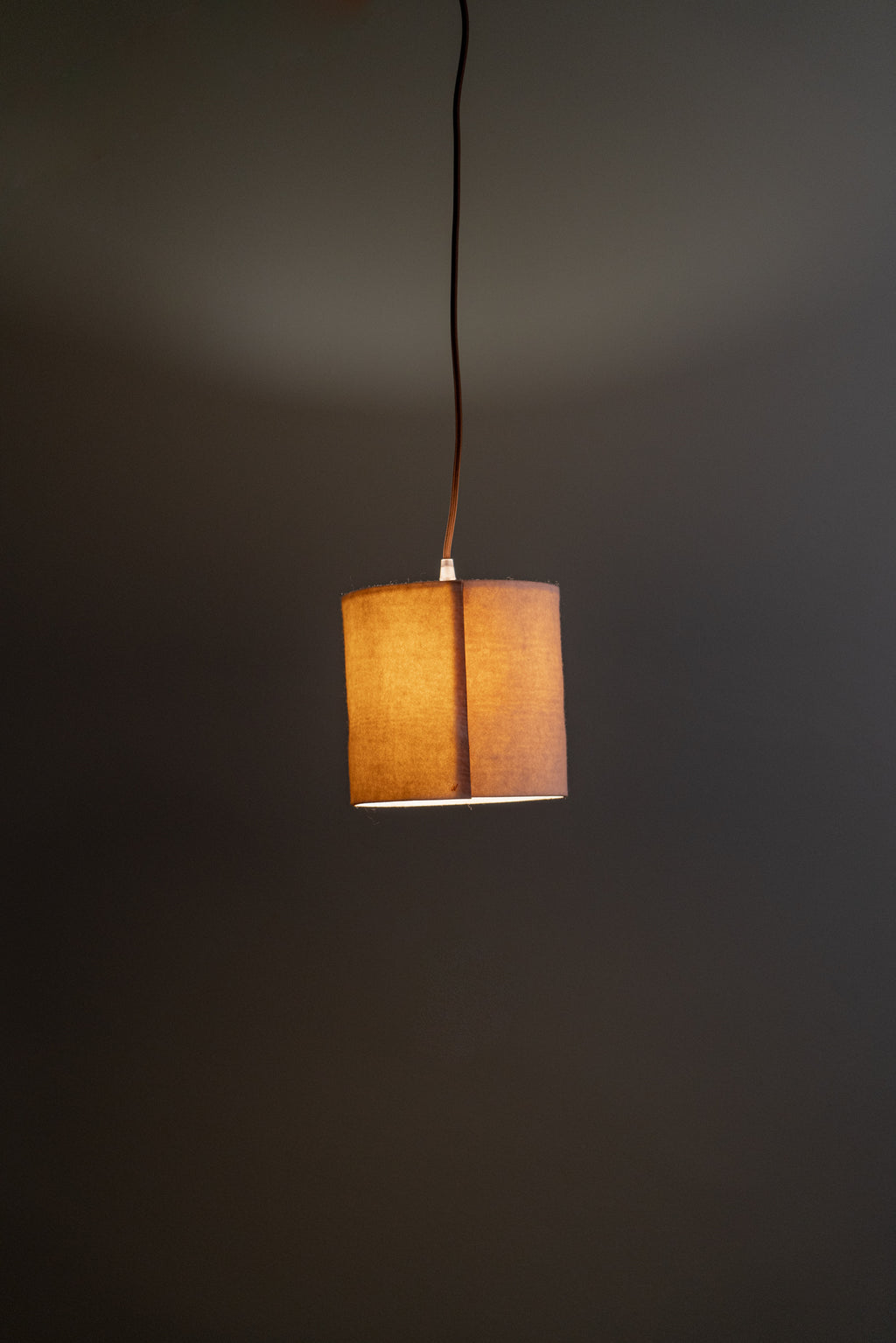 Natural wool ceiling lampshade in minimalist interior, sustainable lighting for boutique hotels and natural homes