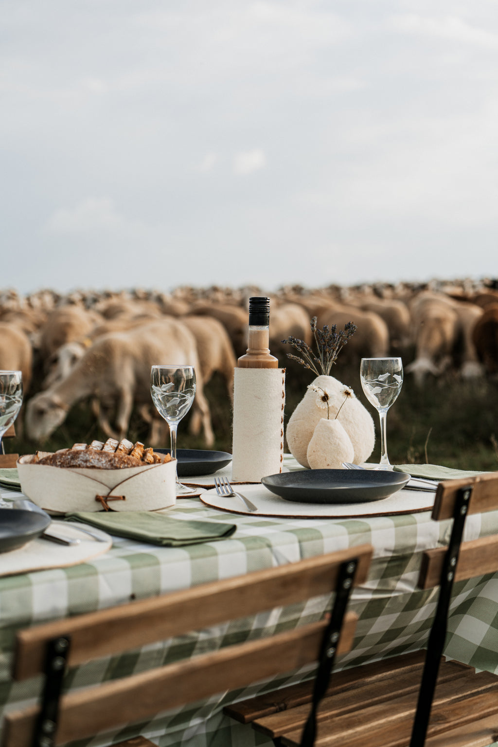 Rustic table setting with natural wool basket, sustainable tableware for countryside homes and boutique hotels